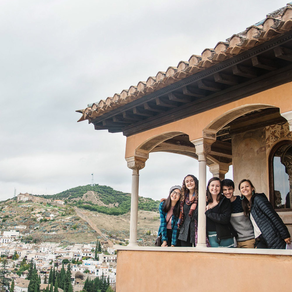 Study abroad students on a balcony