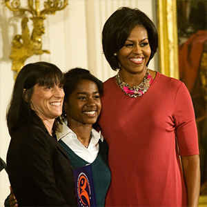 First Lady Michelle Obama presents Scripps College with the 2010 National Arts and Humanities Youth Program Award