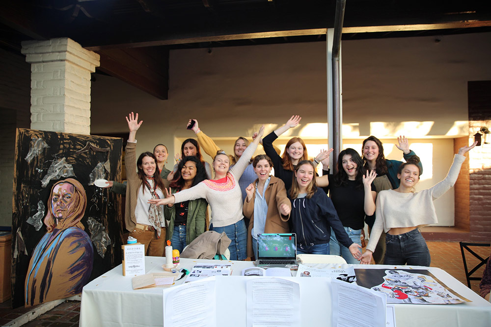 Students at an art presentation in Seal Court.