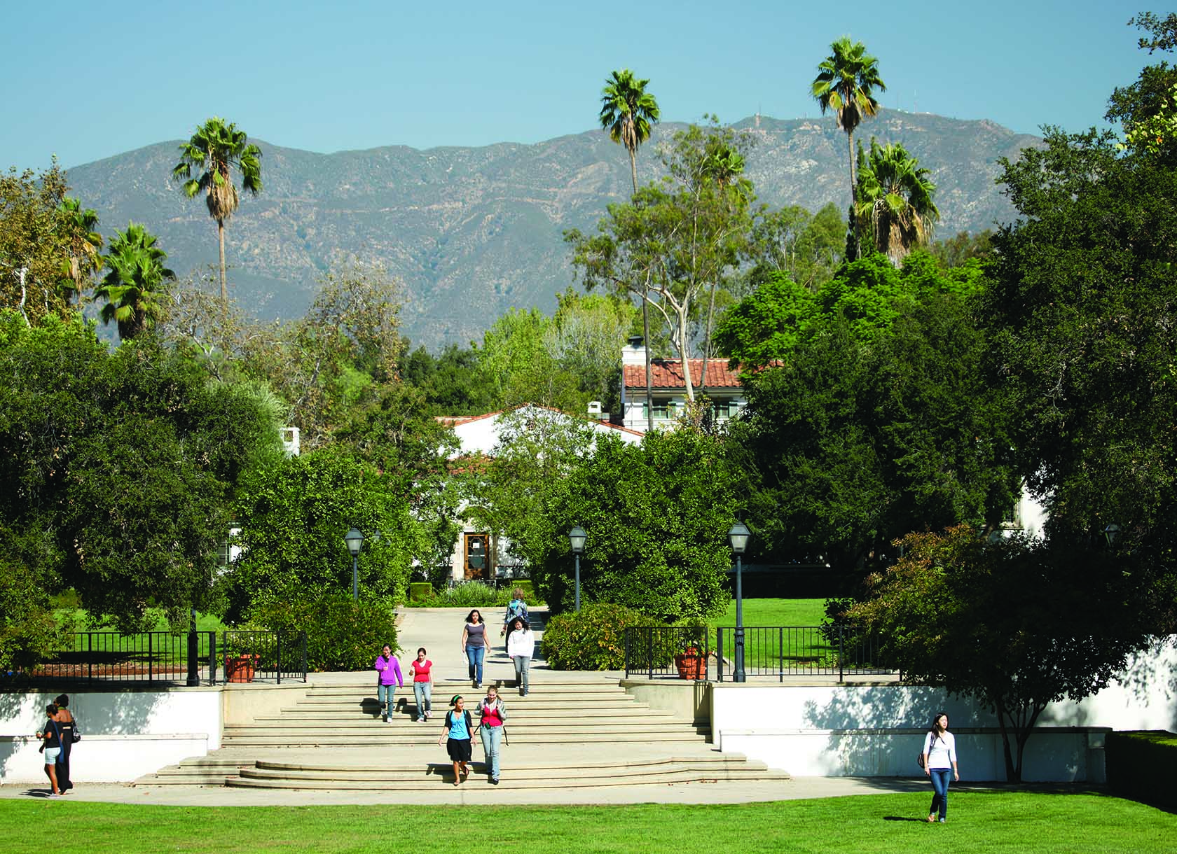 View of bowling green and wood steps with mountains in the background