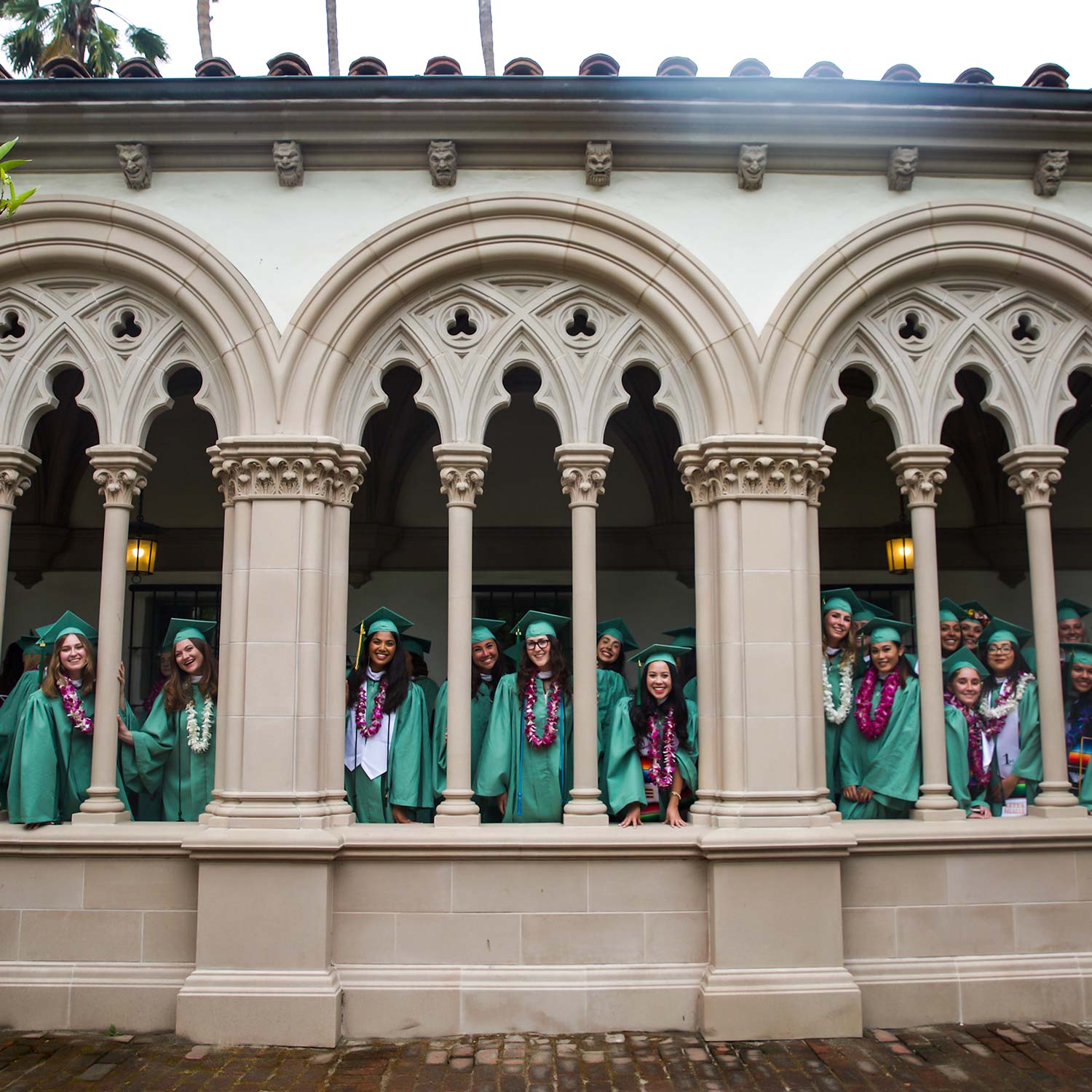 Scripps grads at Denison Library's Courtyard.