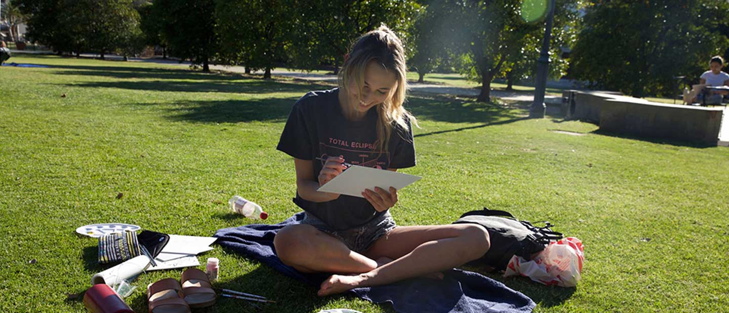 Student outside studying