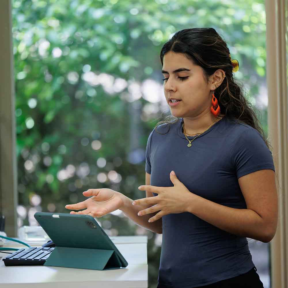 Student presenting in a classroom