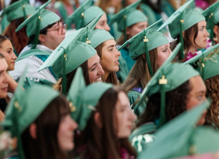 Students sitting at Commencement