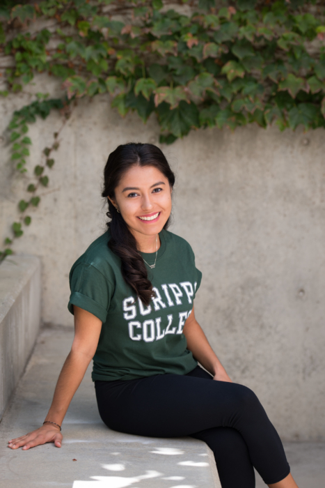 Suzette Guzman '18 sitting on a step