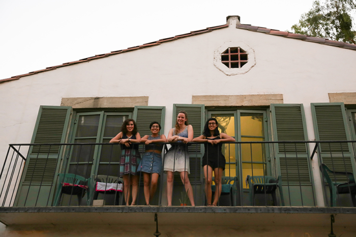 Students on residence hall balcony