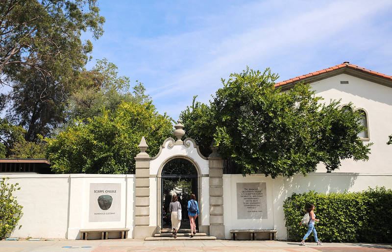 Scripps students walk through Scripps College's Honnold Gate