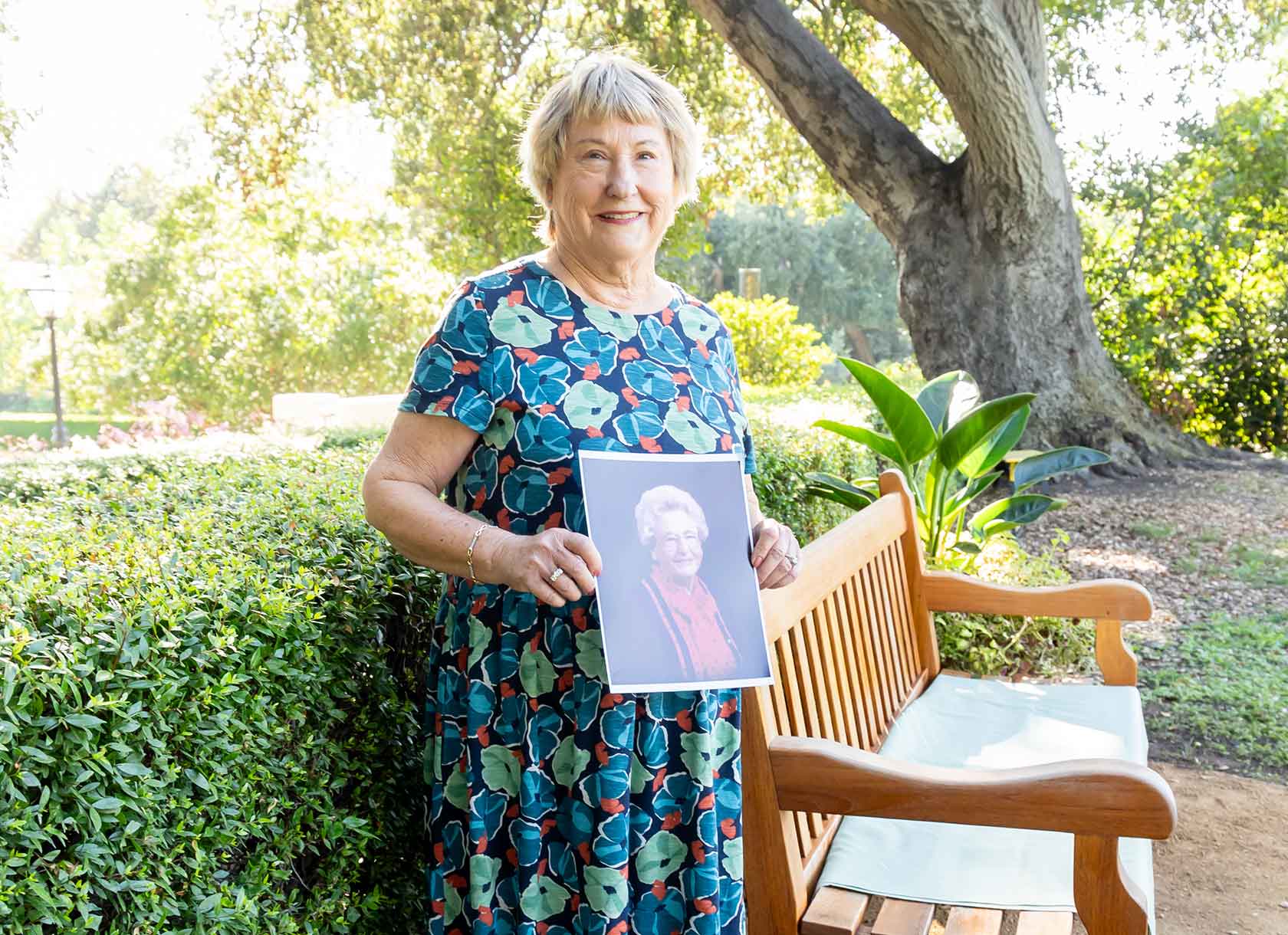 Martha Hatch Reich '71 with Portrait of Mother Ada Hatch '31