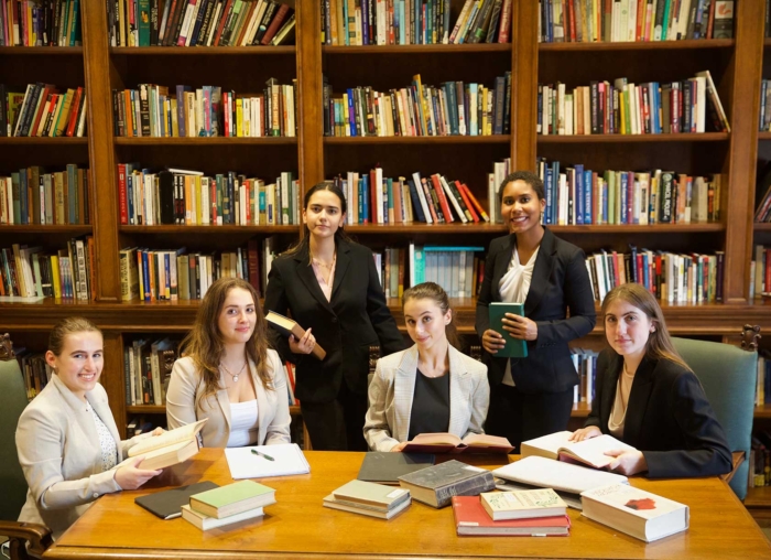 Students in the Pre-Law Society sitting at a table
