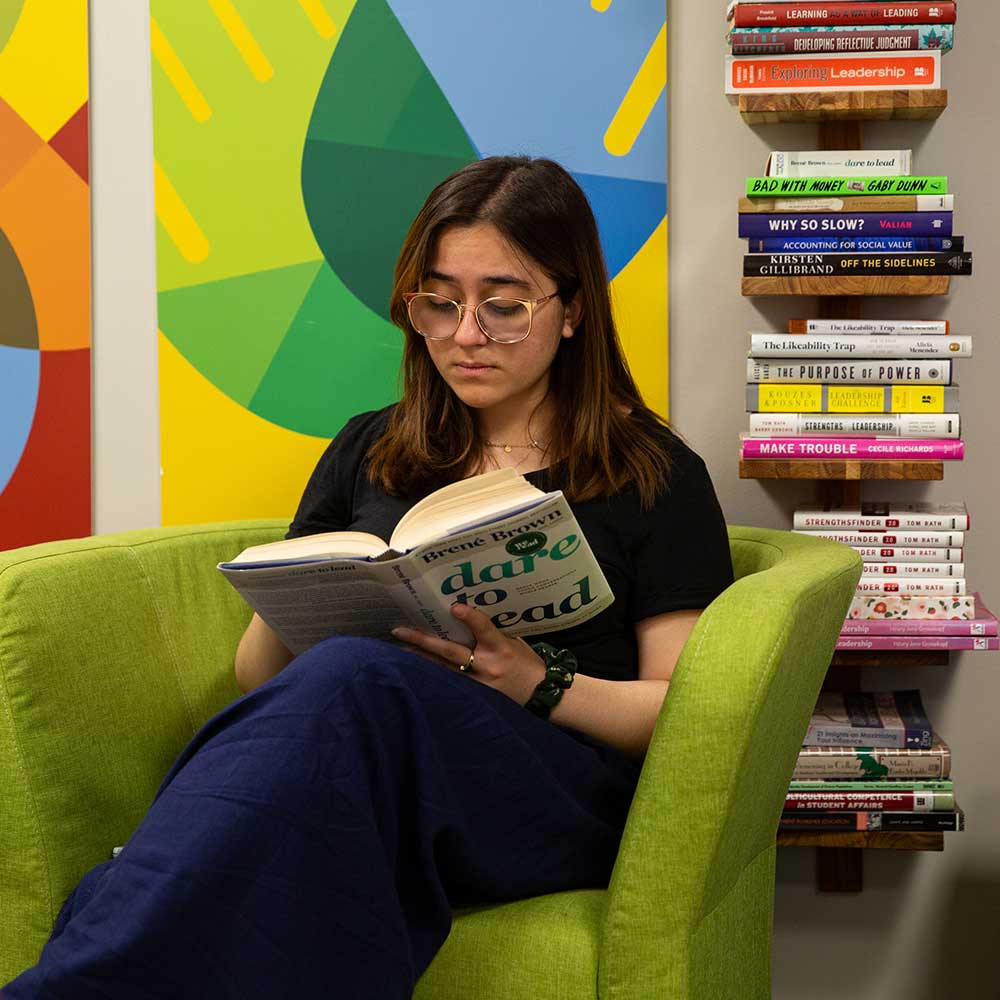 Student reading in the Laspa Center