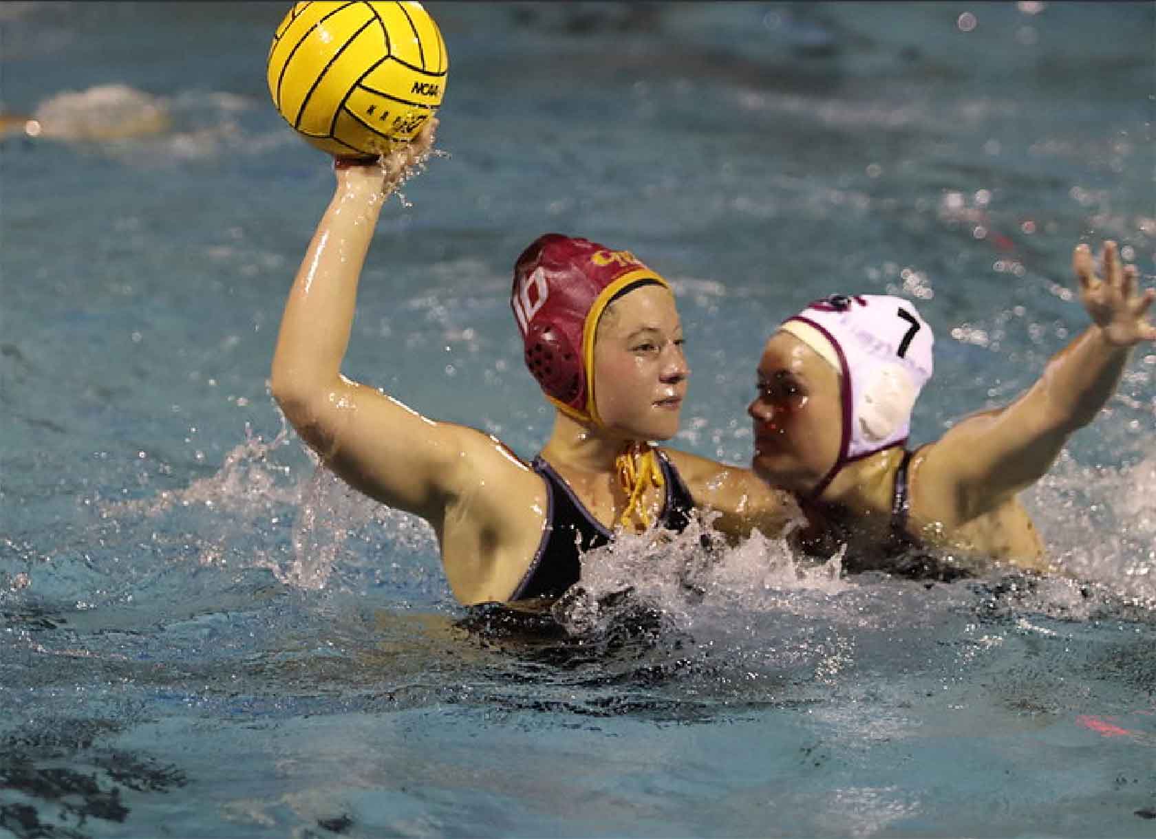 A Scripps College student competes in a water polo match for the Claremont-Mudd-Scripps Athenas