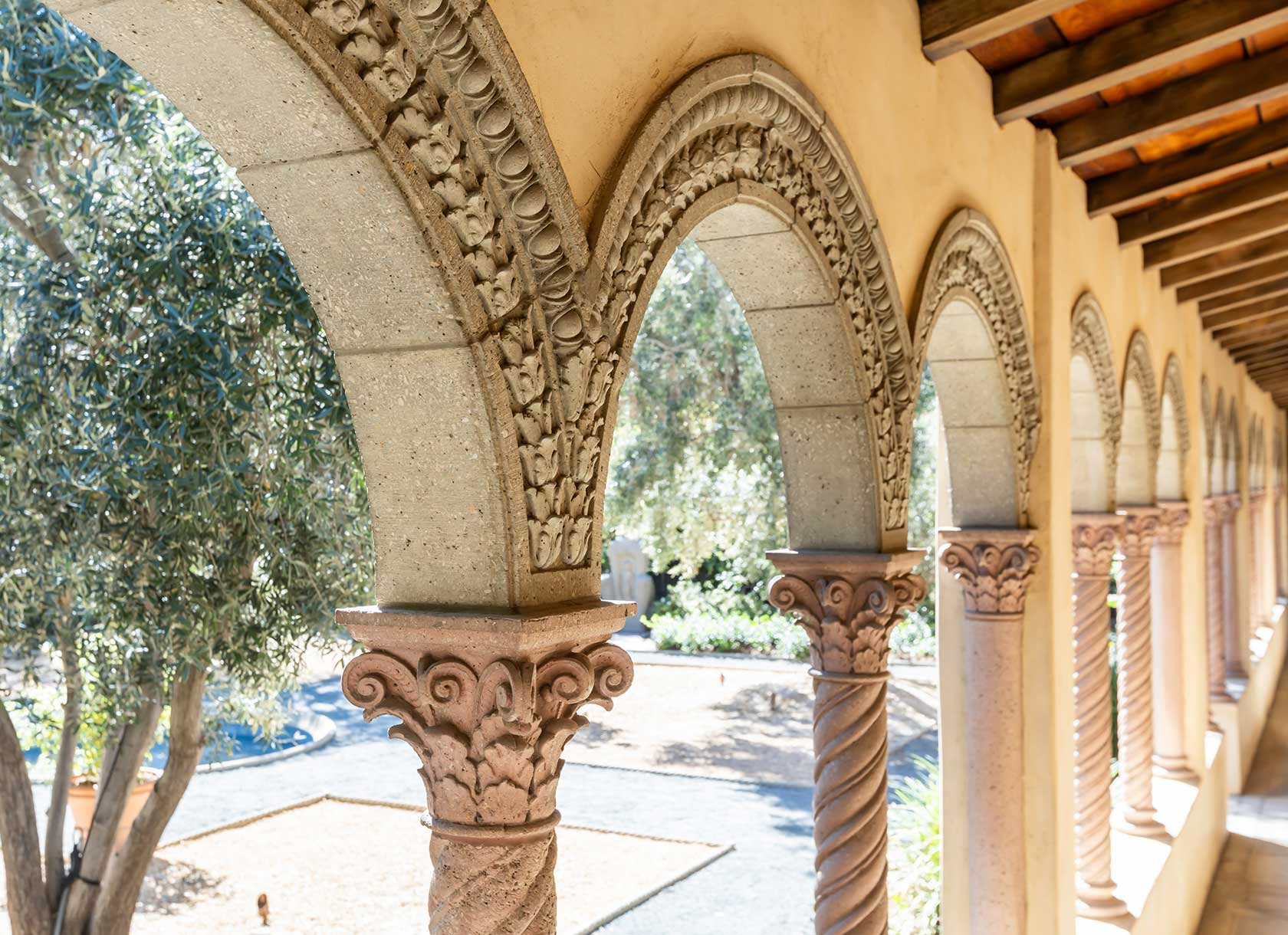 A photograph of stone archways surrounding the Margaret Fowler Garden.