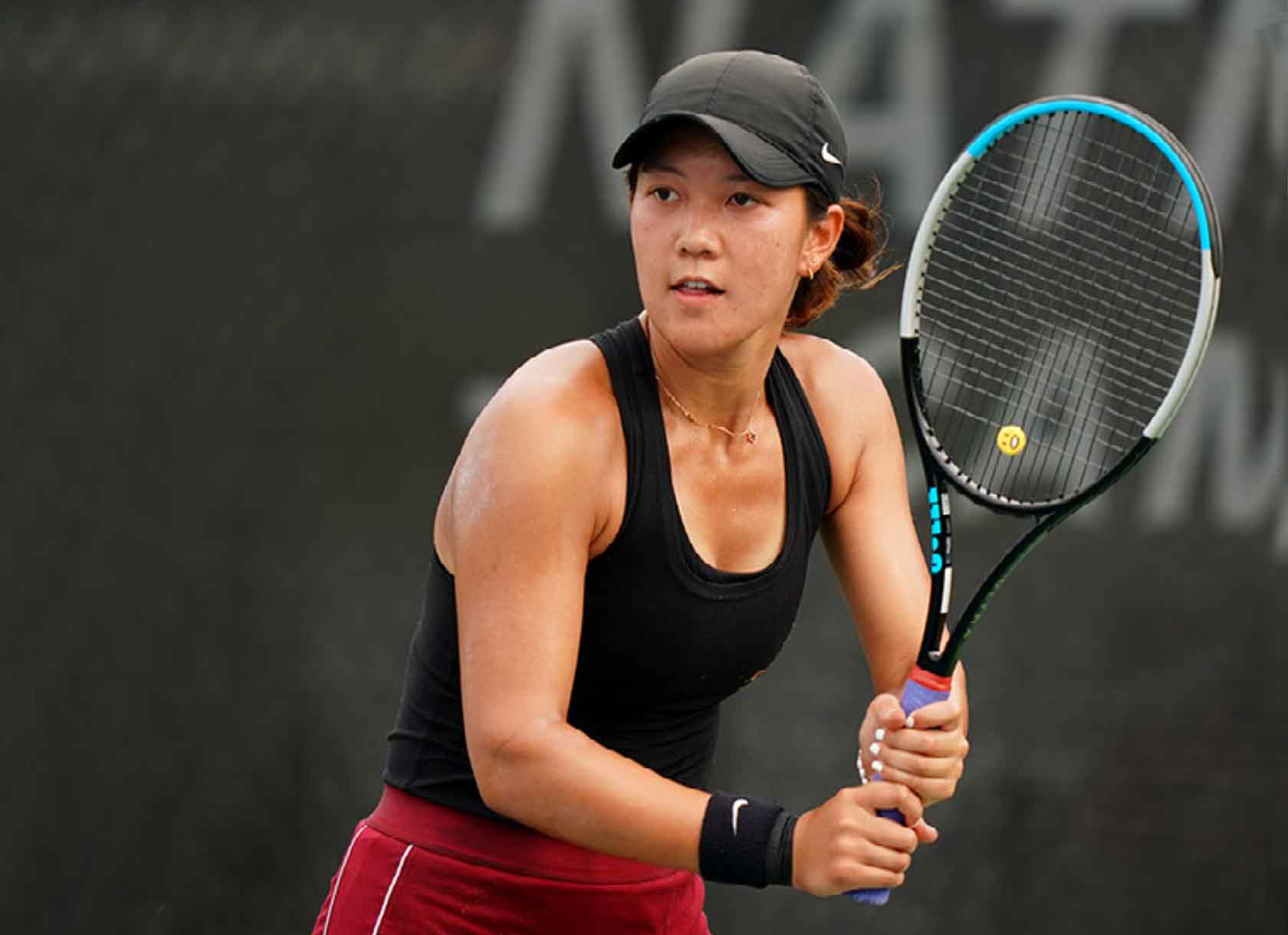 Crystal Juan '22 during a tennis match for the Claremont-Mudd-Scripps Athenas