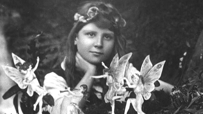 A photograph taken by Elsie Wright in 1917 shows her cousin, Frances Griffiths, visited by fairies.