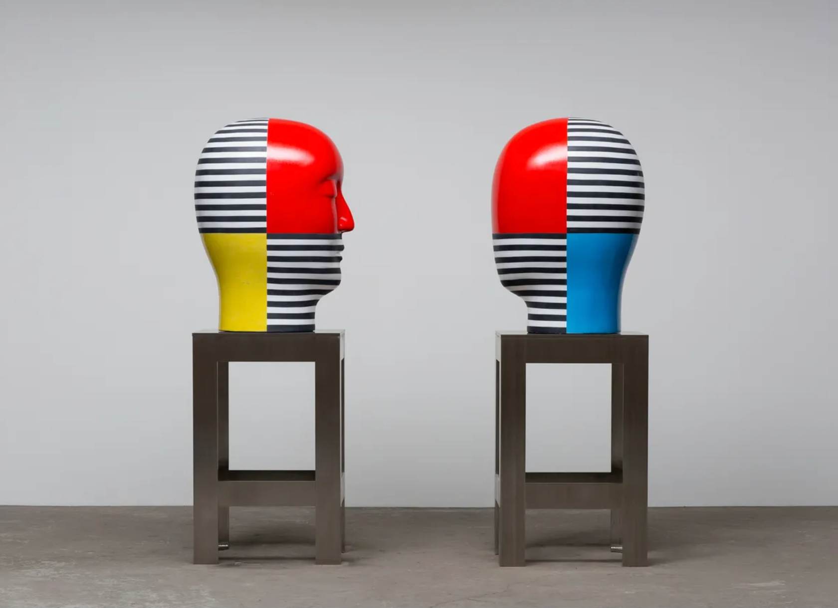 Colorful ceramic head statues by former Scripps faculty Jun Kaneko