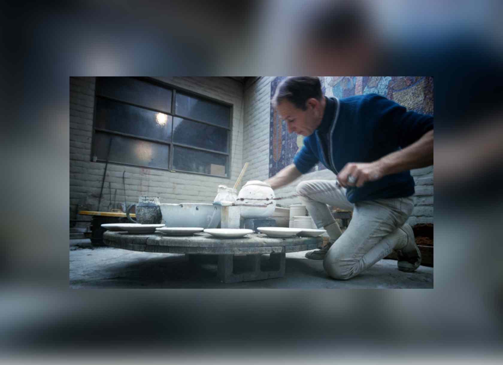 Photo of Paul Soldner creating ceramics