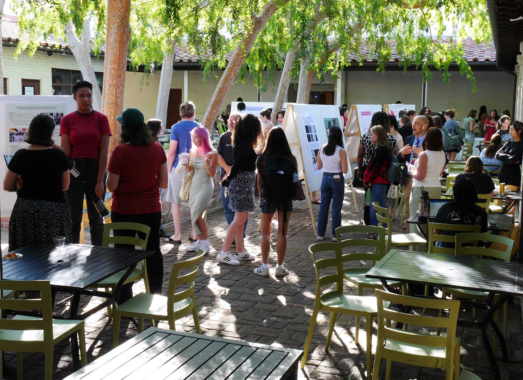 The Scripps community participates in the annual Summer Research Tea