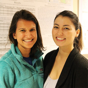 Lia Metzger (right) presents her research at the W. M. Keck Science Department.