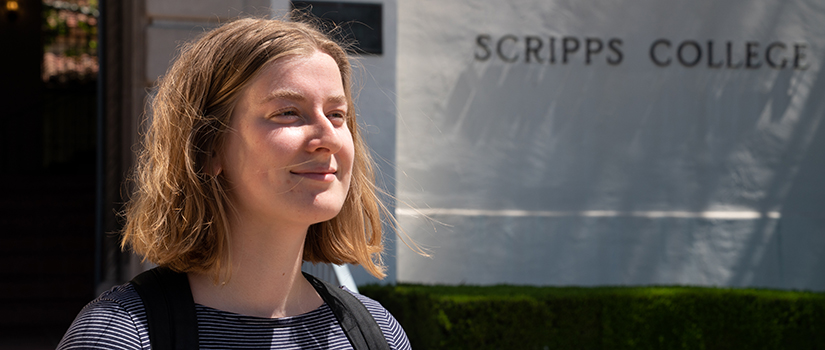 A smiling student as Scripps College
