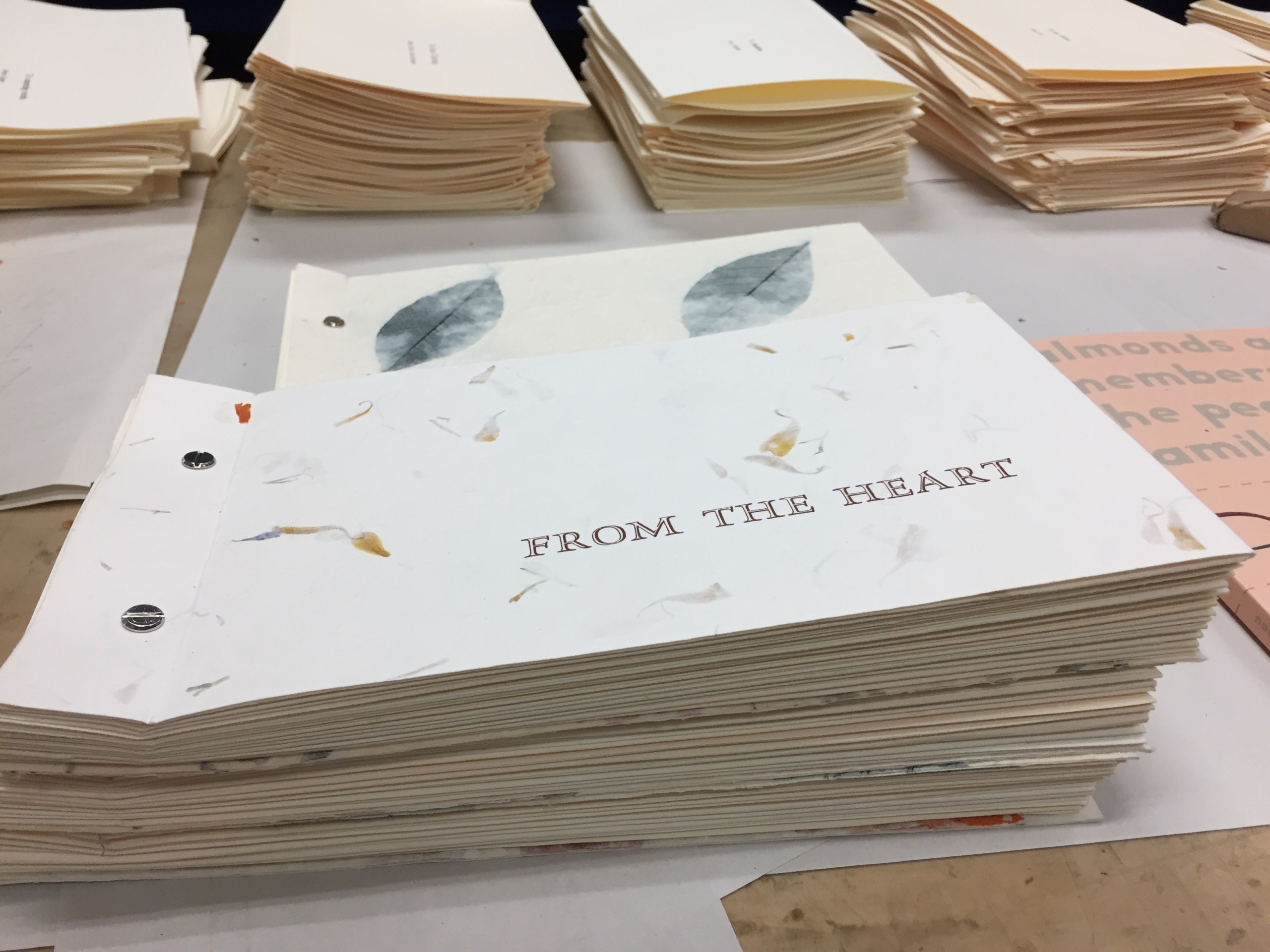 A stack of copies of From the Heart.