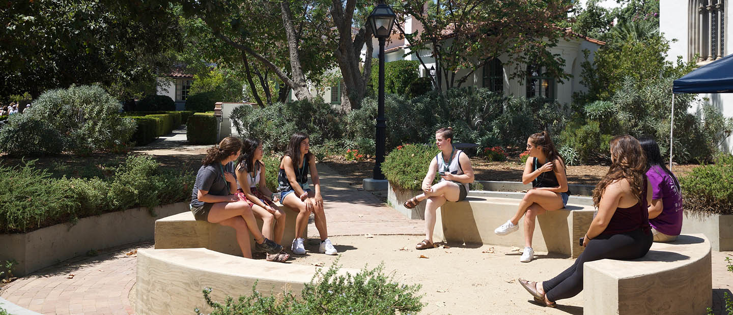 group of students sitting outside