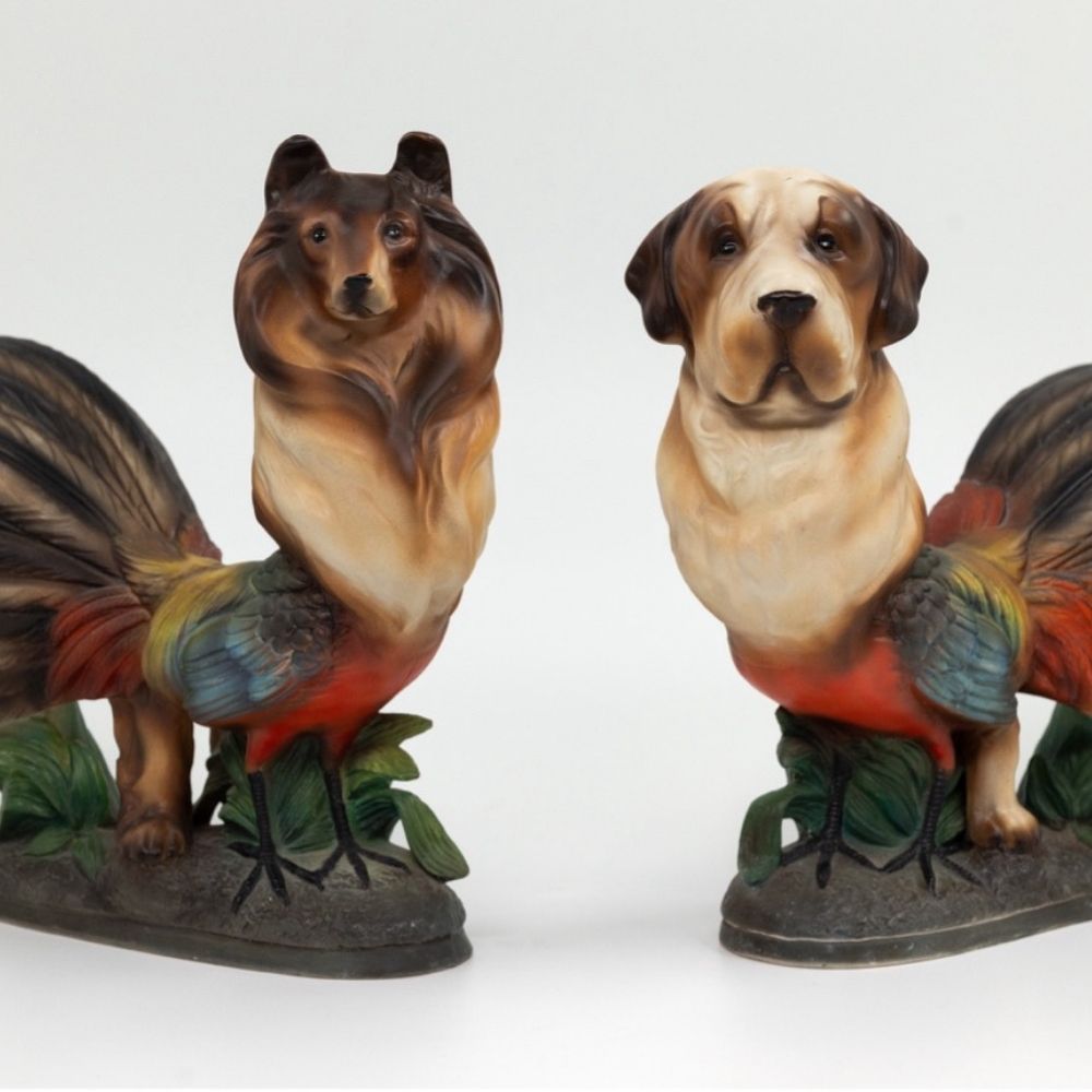 Ceramic sculptures of dogs with bird bodies