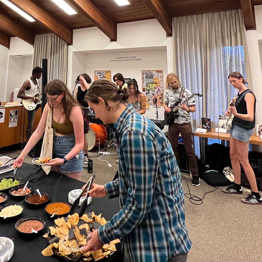 Students gather at an opening at the Clark Humanities Museum at Scripps College