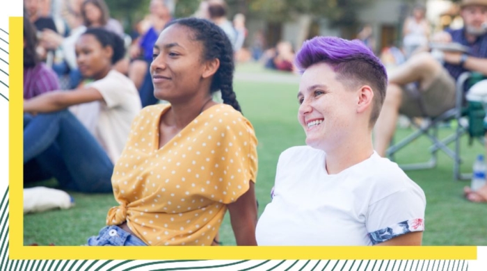 students sitting outside